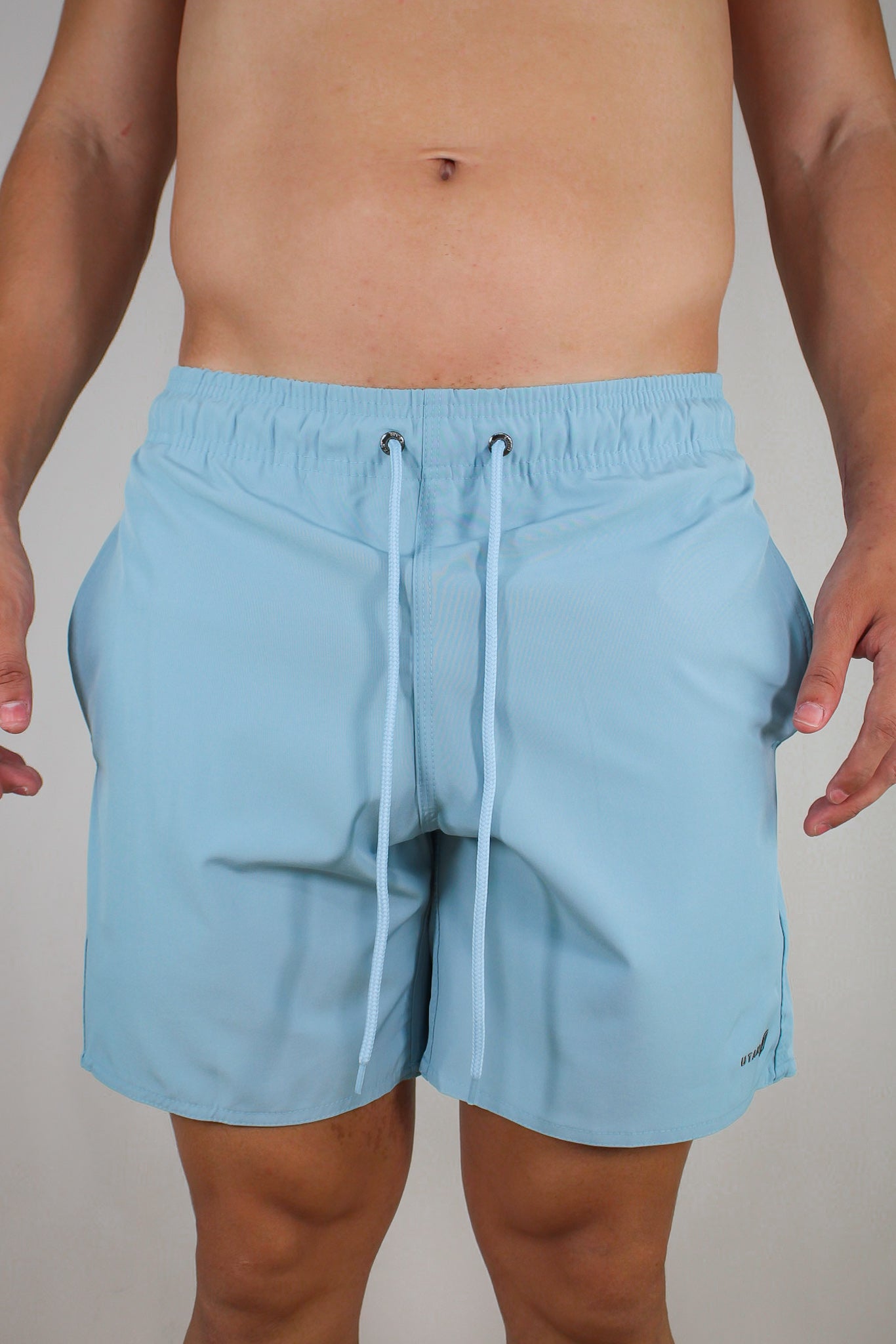 Short Elastano Azul Maya Resistente à Água Utan e Logo