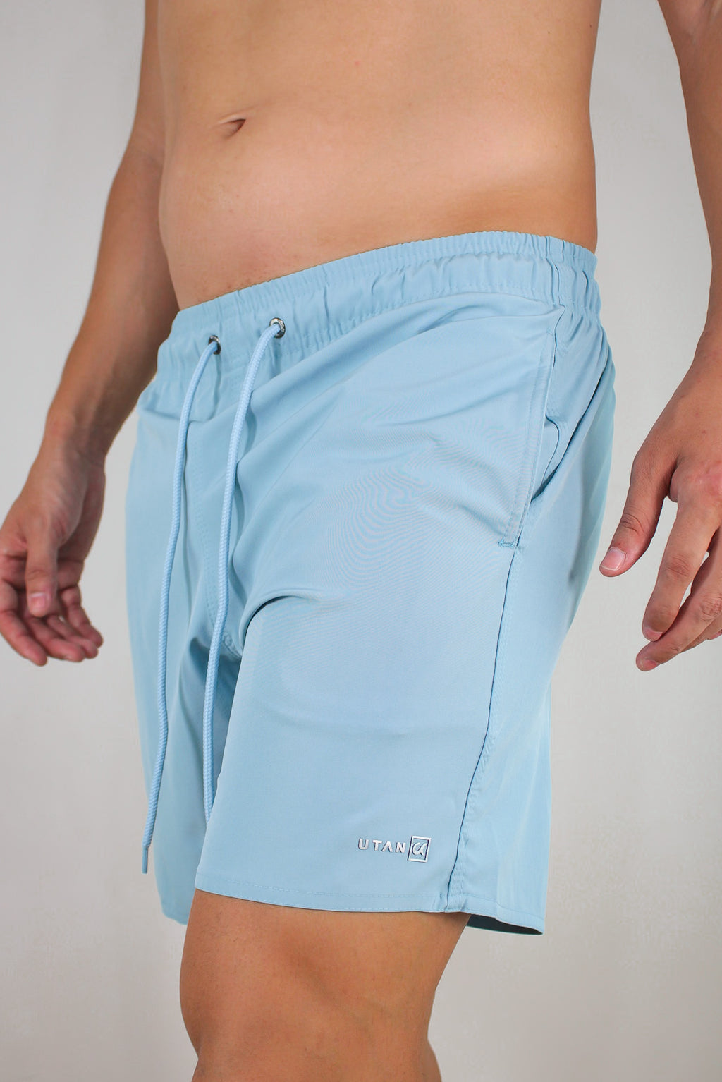 Short Elastano Azul Maya Resistente à Água Utan e Logo