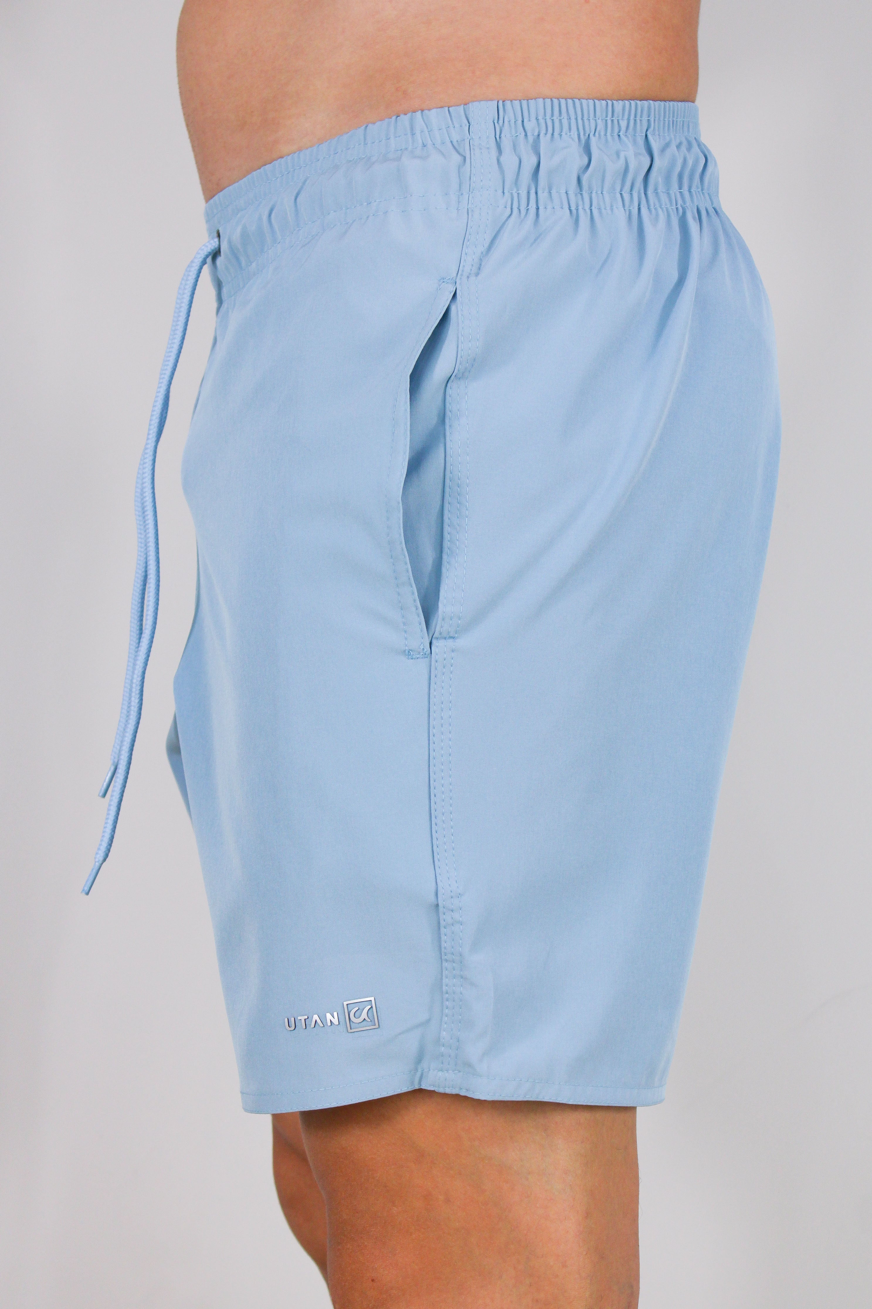 Short Elastano Azul Maya Resistente à Água Utan e Logo