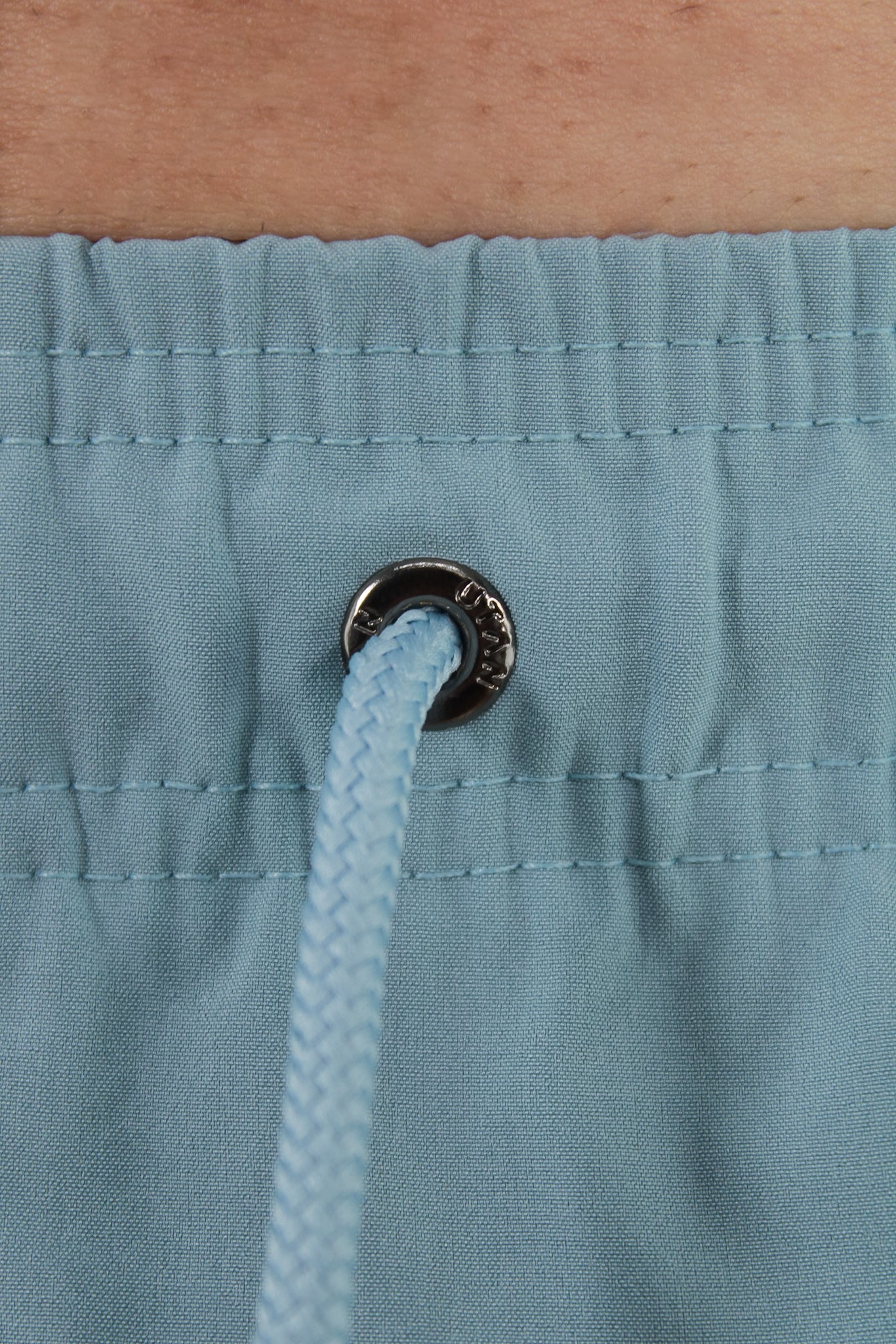 Short Elastano Azul Maya Resistente à Água Utan e Logo