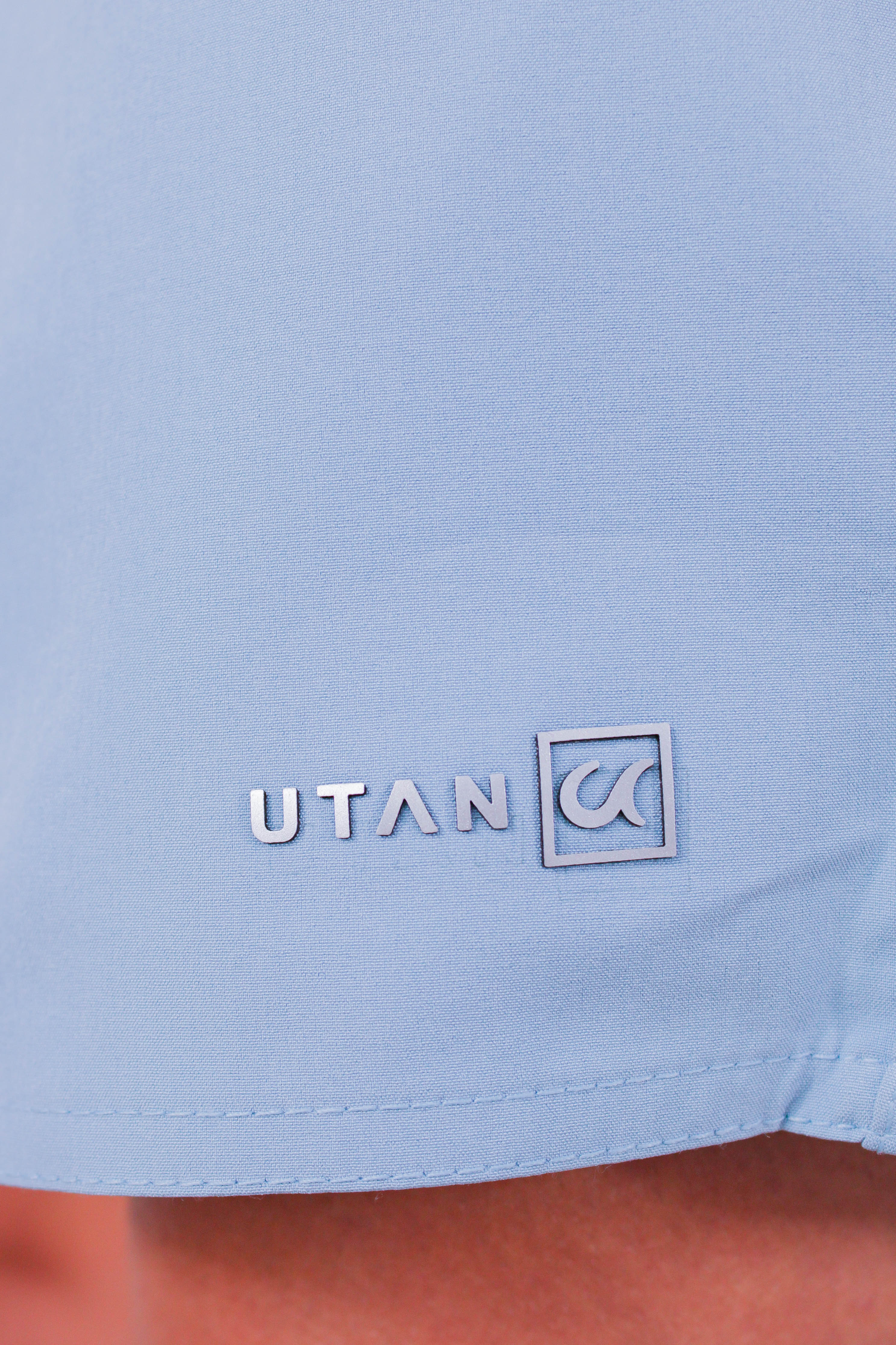 Short Elastano Azul Maya Resistente à Água Utan e Logo