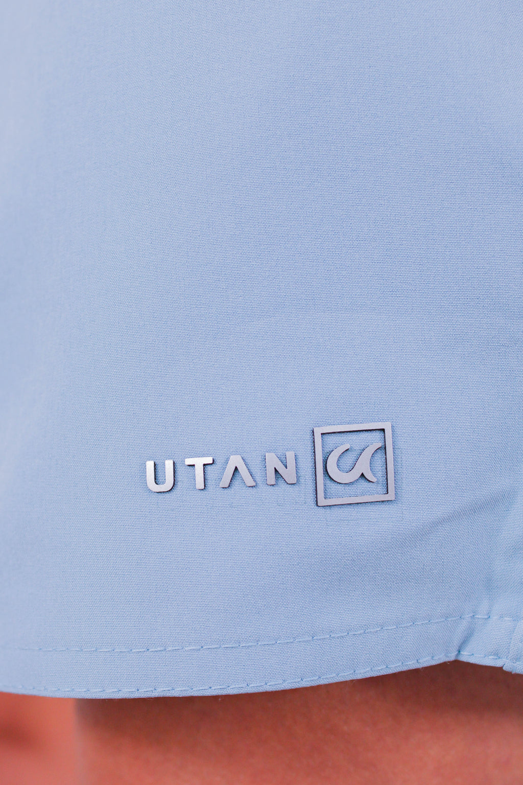 Short Elastano Azul Maya Resistente à Água Utan e Logo